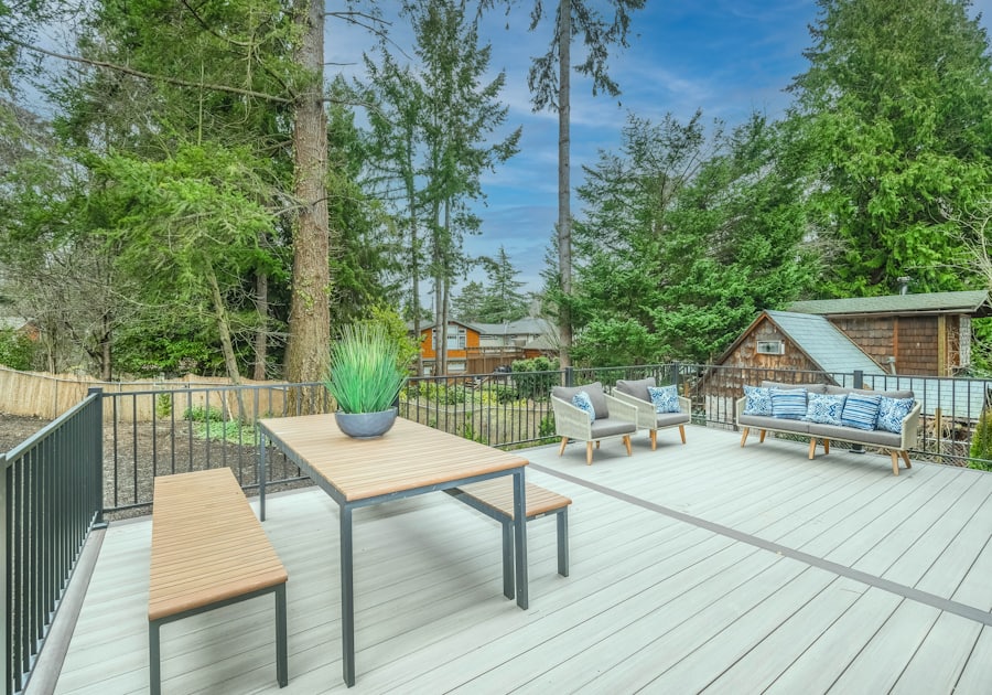 Wooden backyard deck with table and chairs